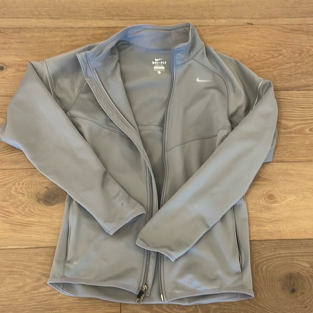 Nike runner jacket with sleeve holds